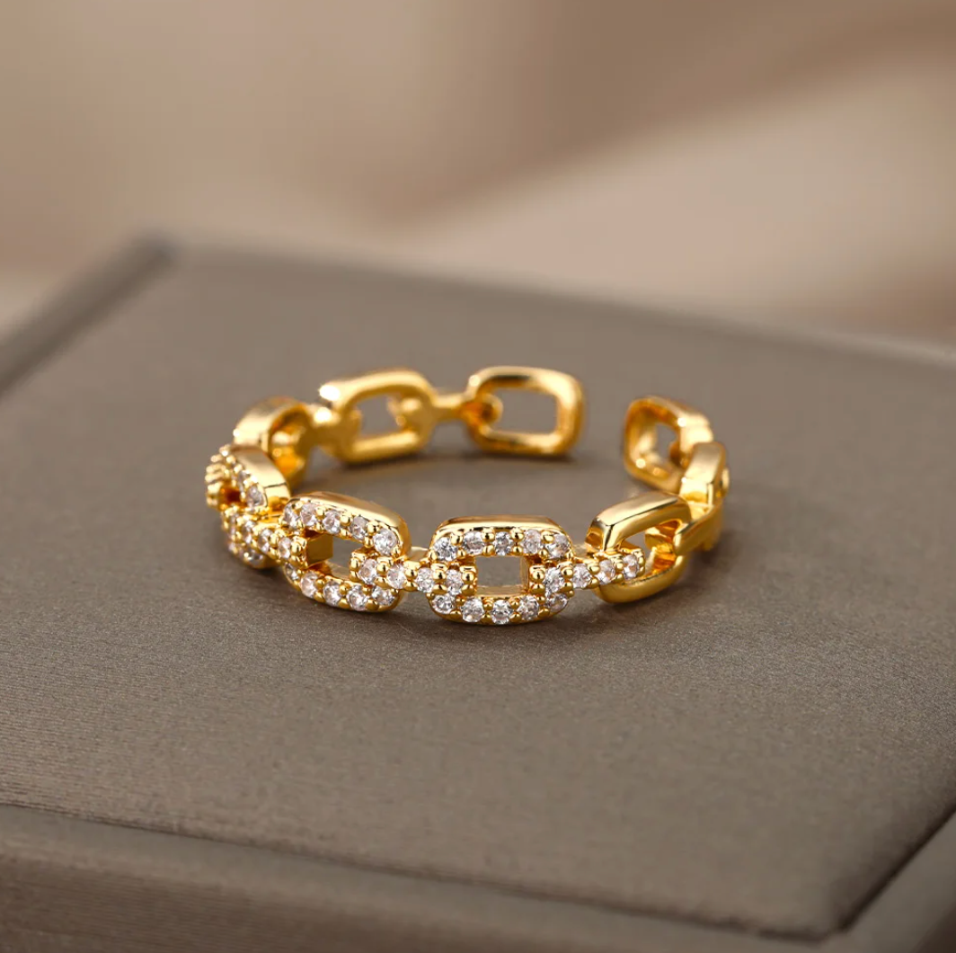 18 Karat gold-plated ring with love chain and rhinestones