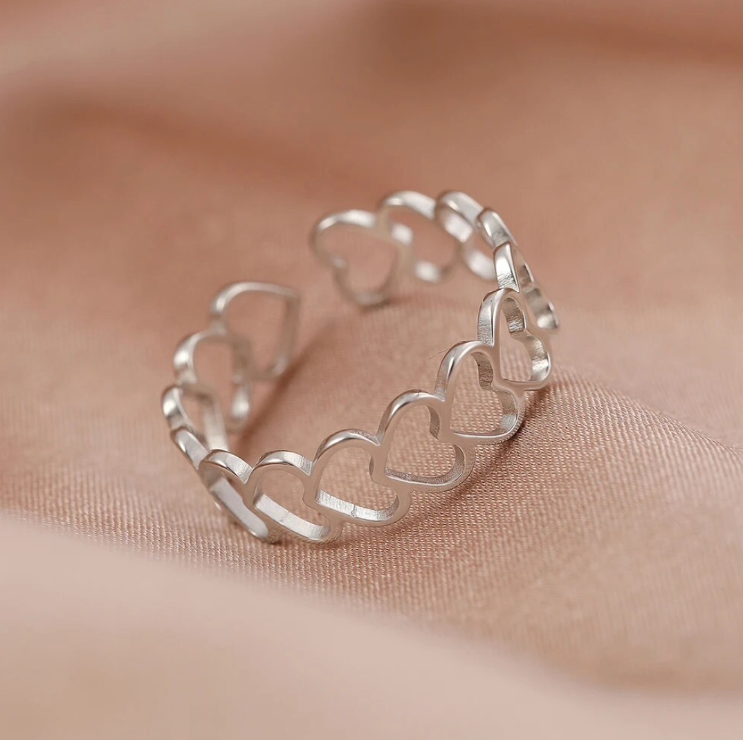 Ring with hearts in circumference in sterling silver 925