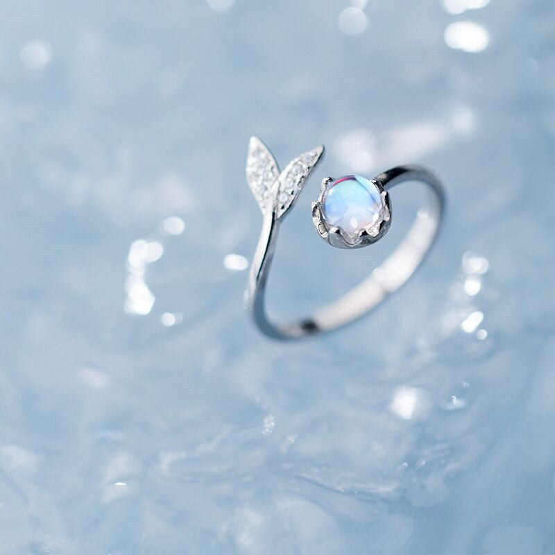 Adjustable Ring with Dolphin Tail made of Sterling Silver and Blue Zirconia