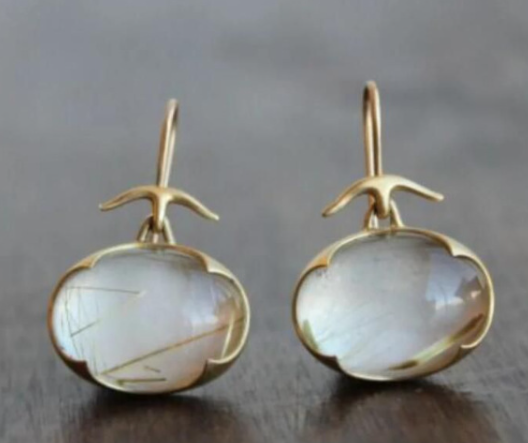 Vintage earrings with green moonstone