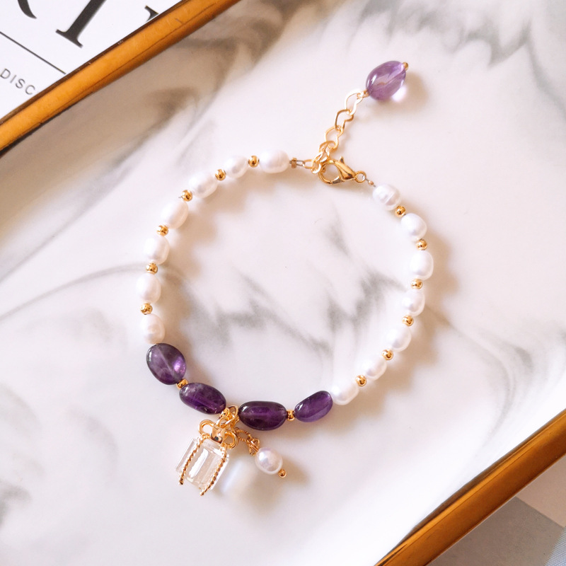 Bracelet with purple stones and gold beads