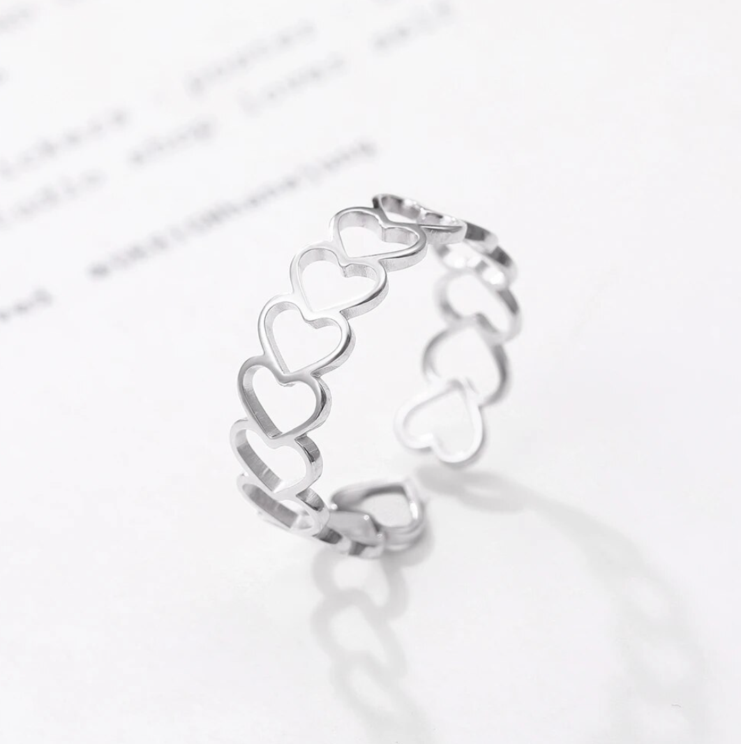 Ring with hearts in circumference in sterling silver 925