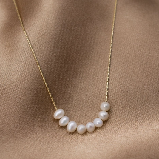 Gold pearl necklace