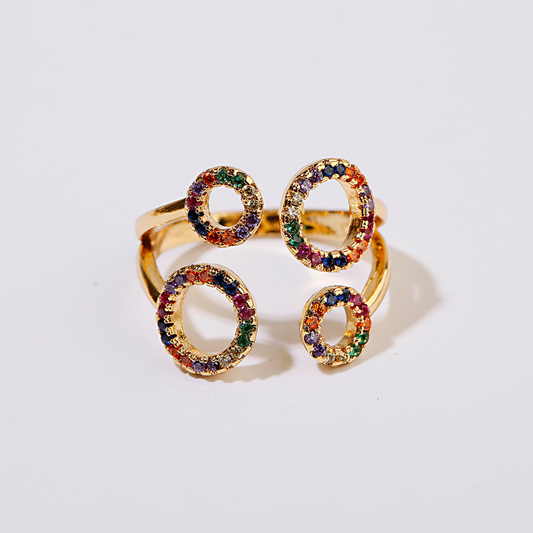 Adjustable ring made of 18K gold with pearls and zirconia stones