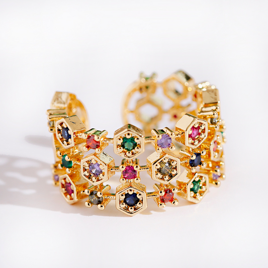 Adjustable ring made of 18K gold with colored zircon stones
