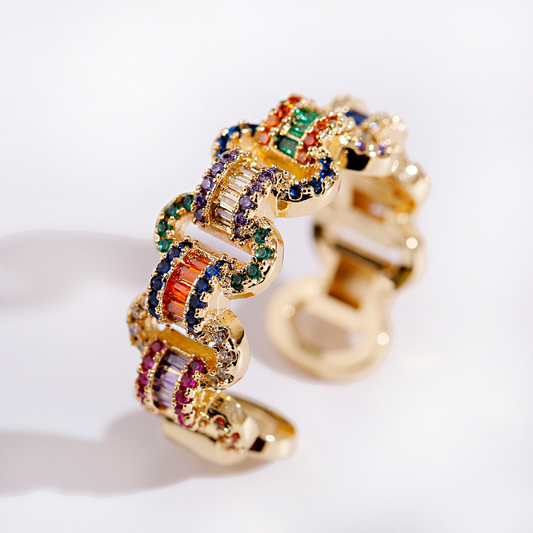 Adjustable ring made of 18K gold with colored zirconia stones