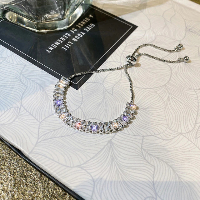 Adjustable cubic zirconia bracelet in gold and silver