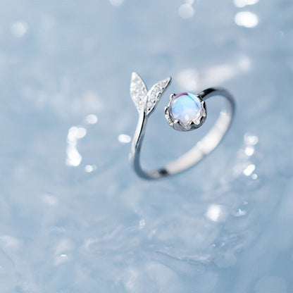 Adjustable Ring with Dolphin Tail made of Sterling Silver and Blue Zirconia