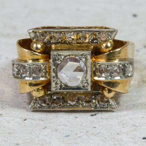 Vintage-style gold ring with white crystal