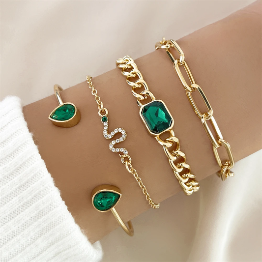 Pack of bracelets with green crystals
