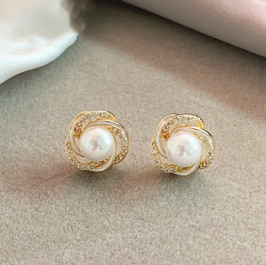 Elegant gold zirconia spiral drop earrings
