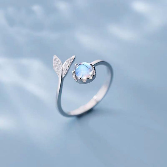 Adjustable Ring with Dolphin Tail made of Sterling Silver and Blue Zirconia